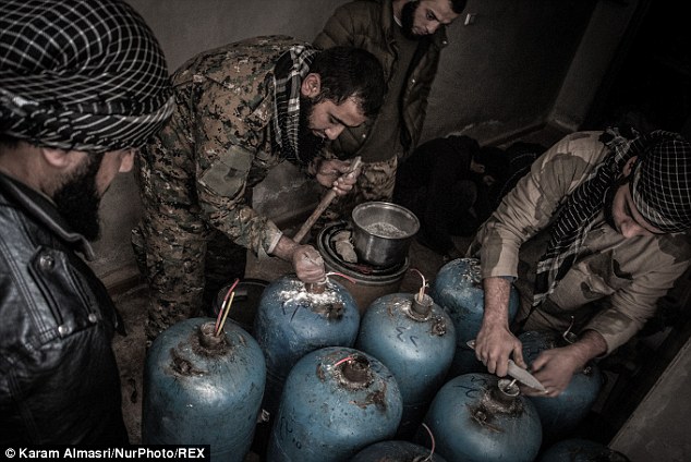 Terrorist forces packing gas canisters with explosives to arm their Hell Cannons